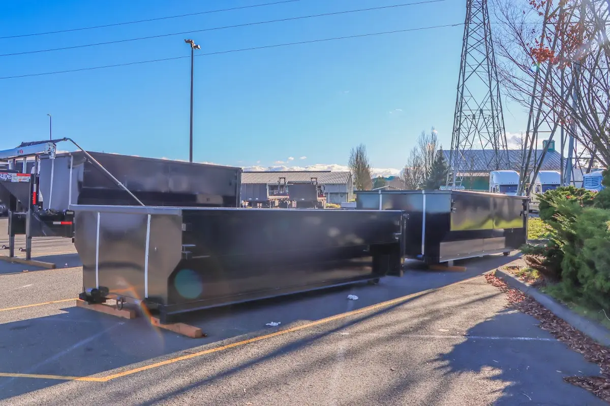 Roll-off dumpster ready for waste disposal at job site for 2 Yard Dumpster Rental in Pampa